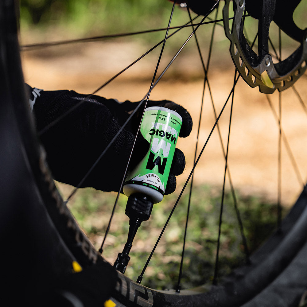 Magic Milk Tubeless-Pro Hi-Fibre sealant in use — MTB, gravel and road tubeless riding