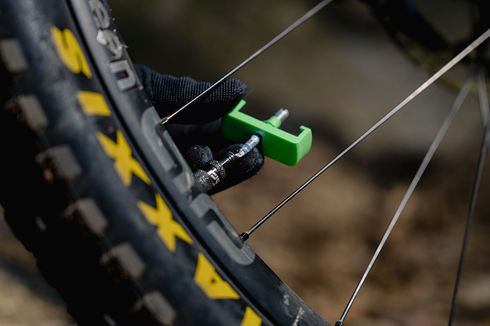 Magic Milk Tubeless-Pro Hi-Fibre sealant in use — MTB, gravel and road tubeless riding