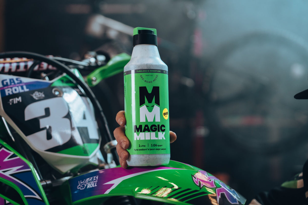 Magic Milk Off-Road Moto sealant with an off-road motorcycle